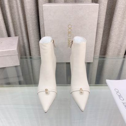 Botines blancos de mujer con joya
