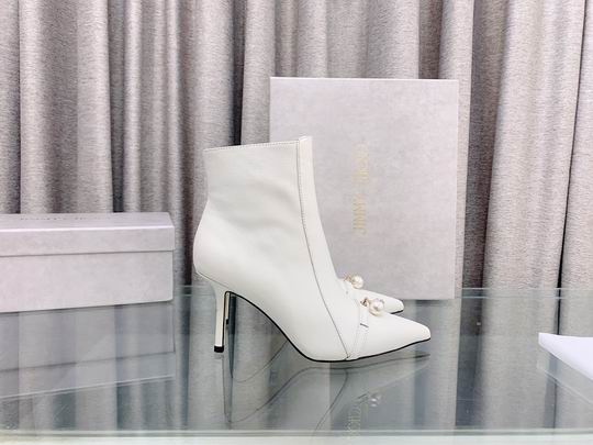 Botines blancos de mujer con joya