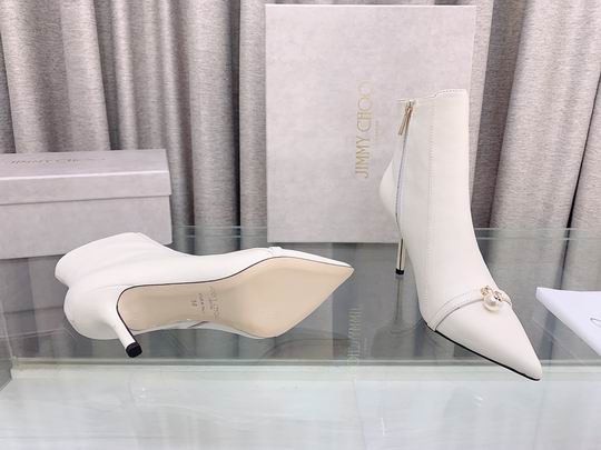Botines blancos de mujer con joya