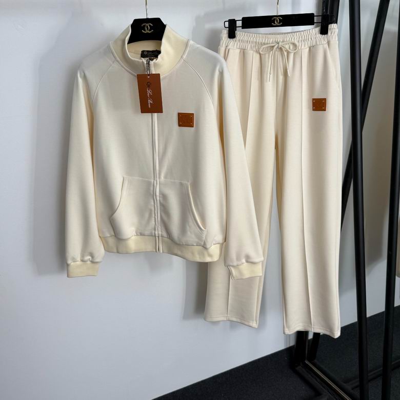 Conjunto de chaqueta y pantalón azul marino con cremallera