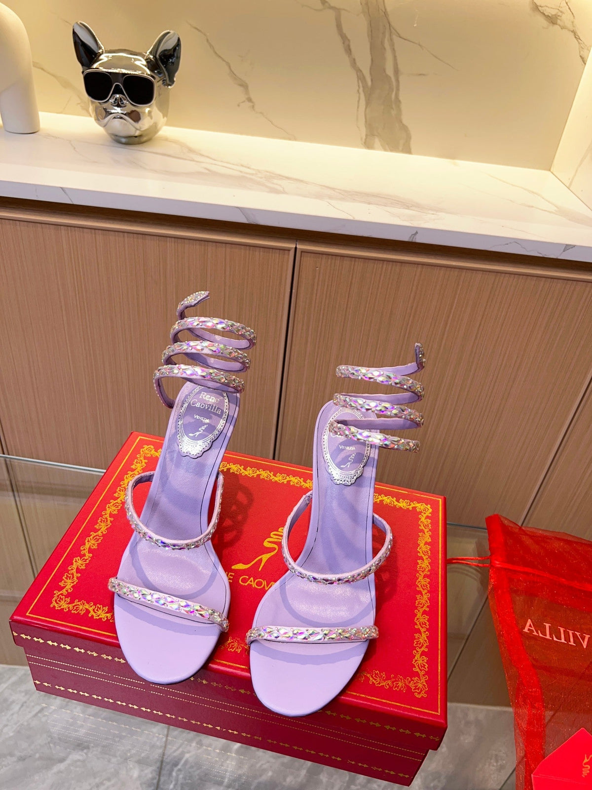 Sandalias de cristal con forma de serpiente