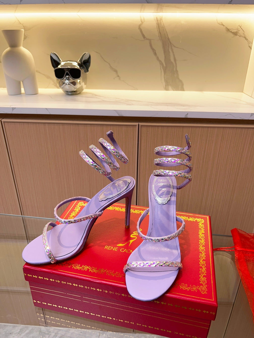 Sandalias de cristal con forma de serpiente
