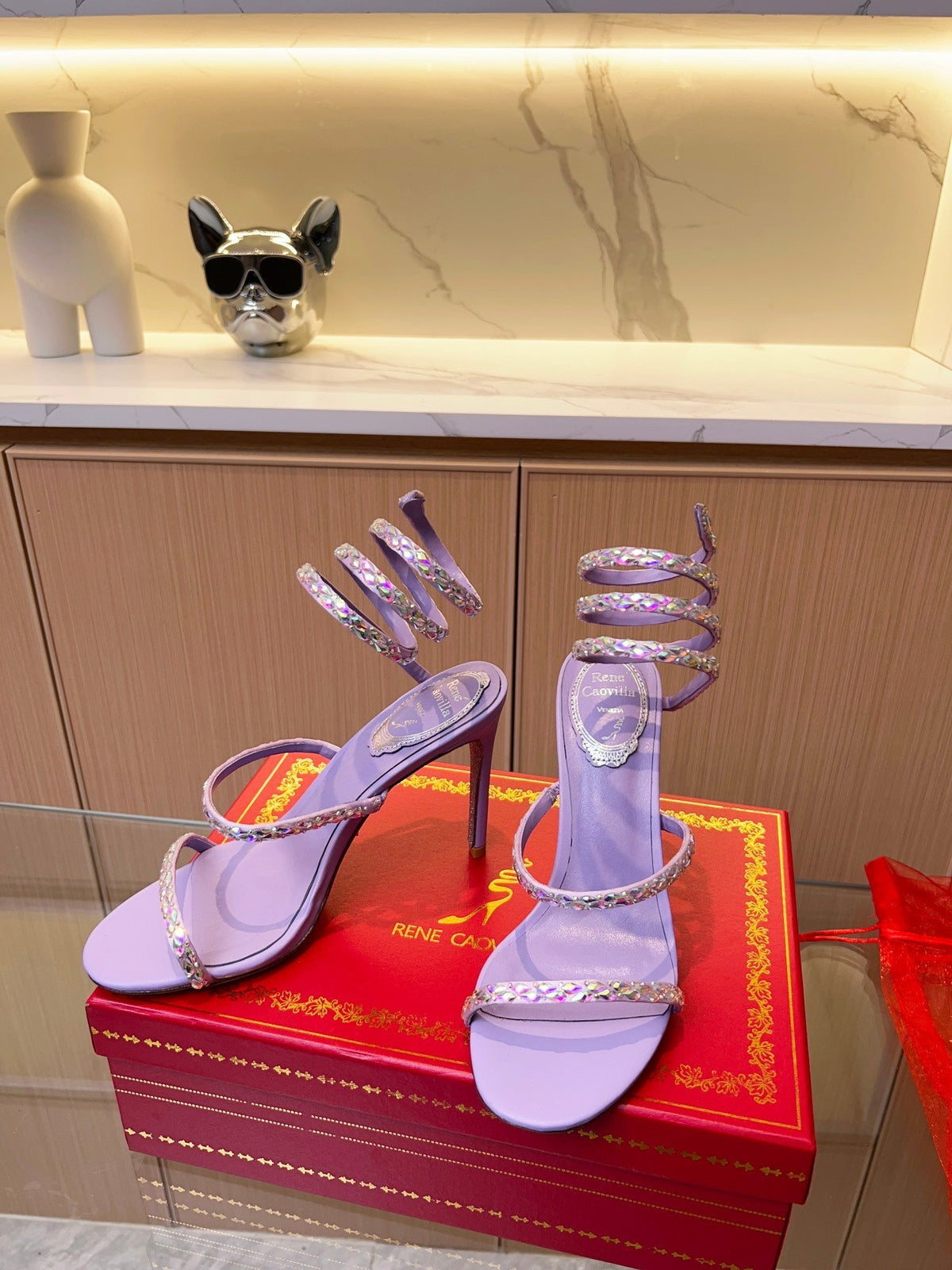 Sandalias de cristal con forma de serpiente