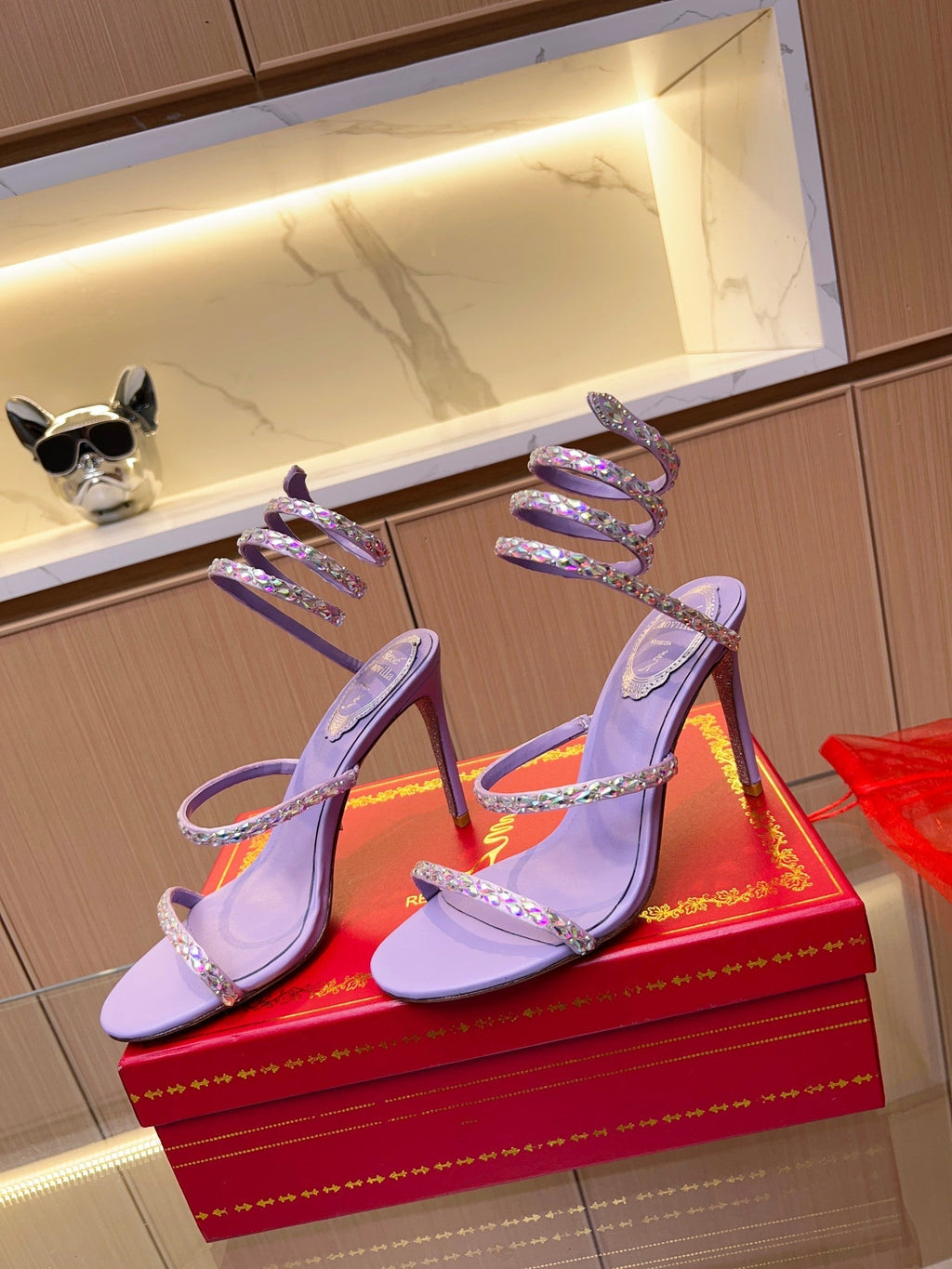 Sandalias de cristal con forma de serpiente