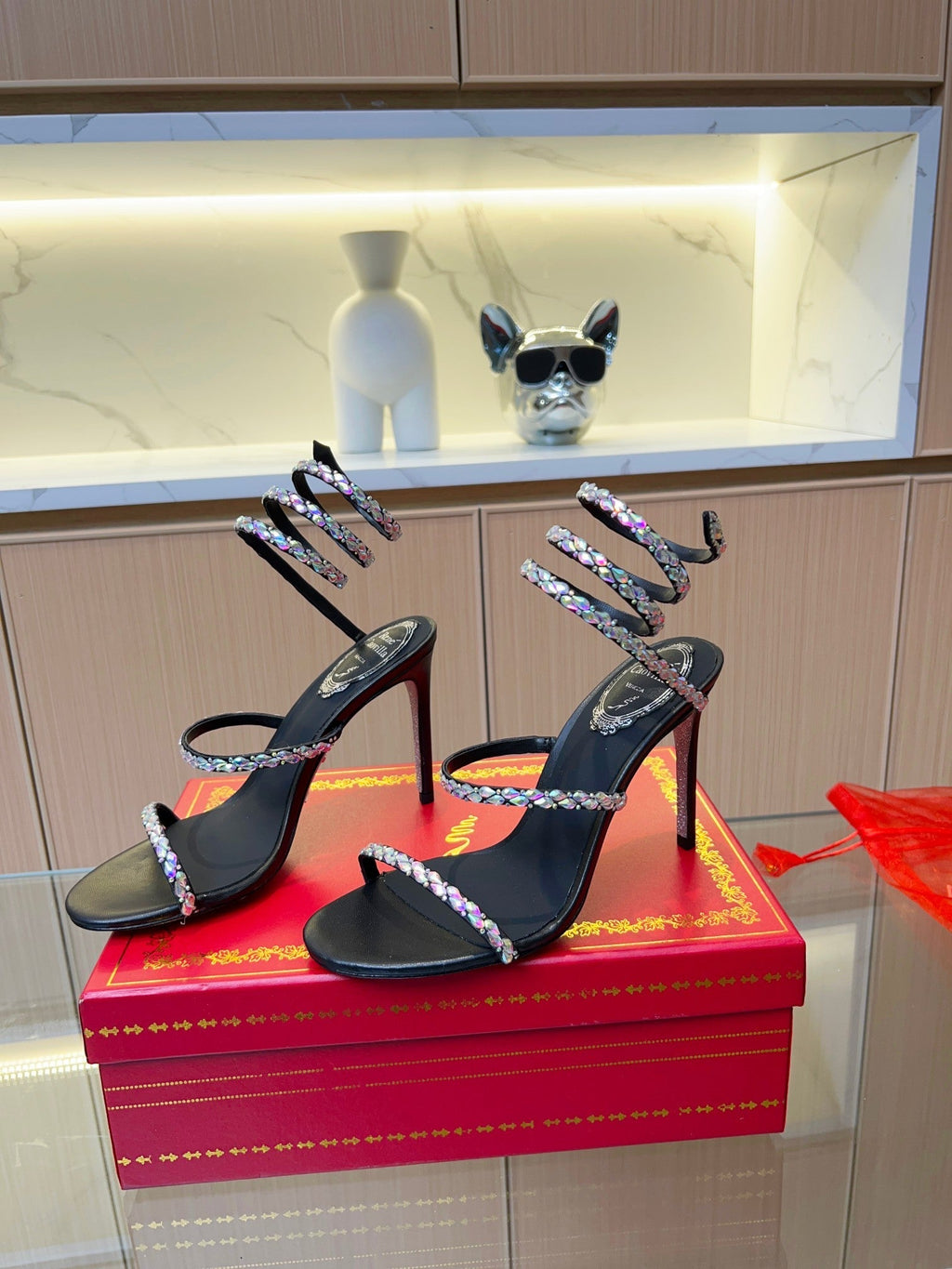 Sandalias de cristal con forma de serpiente