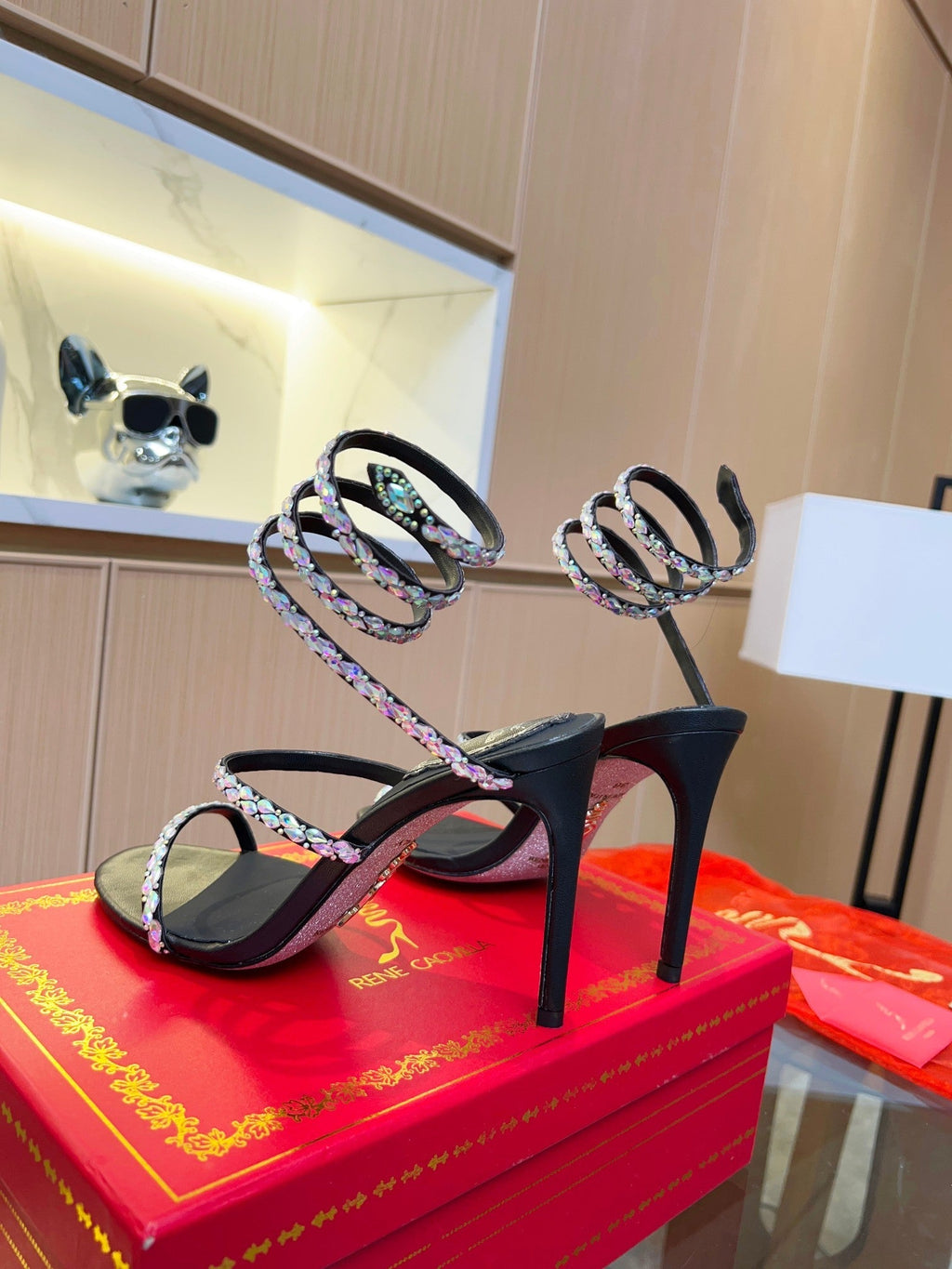 Sandalias de cristal con forma de serpiente