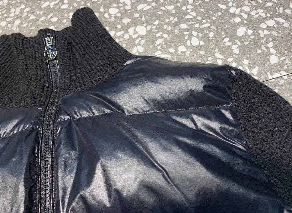 Chaqueta de plumón con mangas de punto de lana