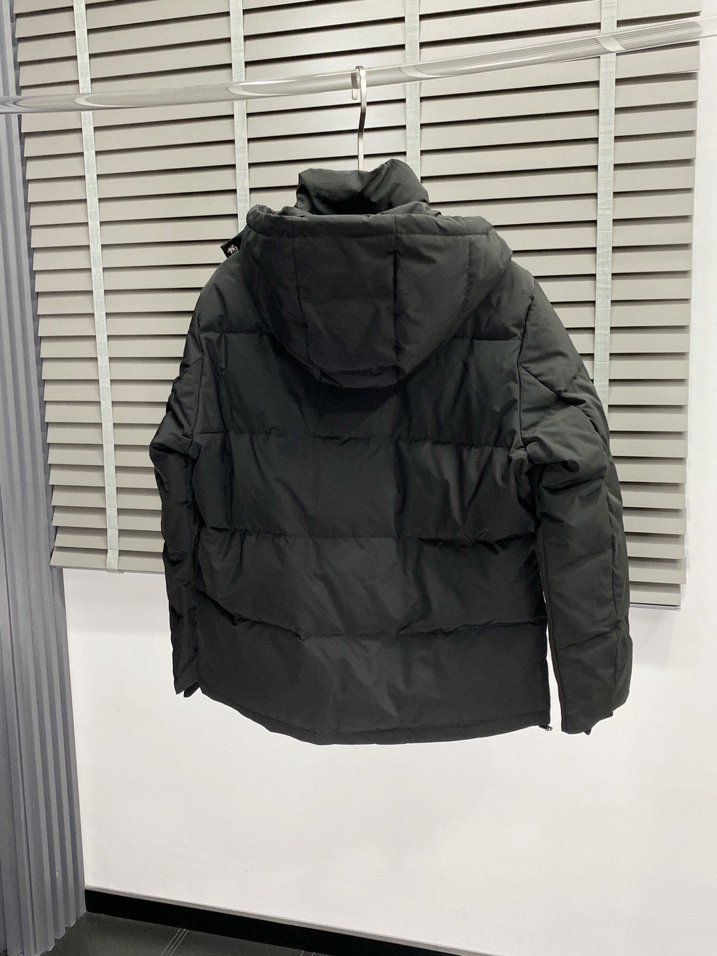 Chaqueta acolchada con capucha de plumón