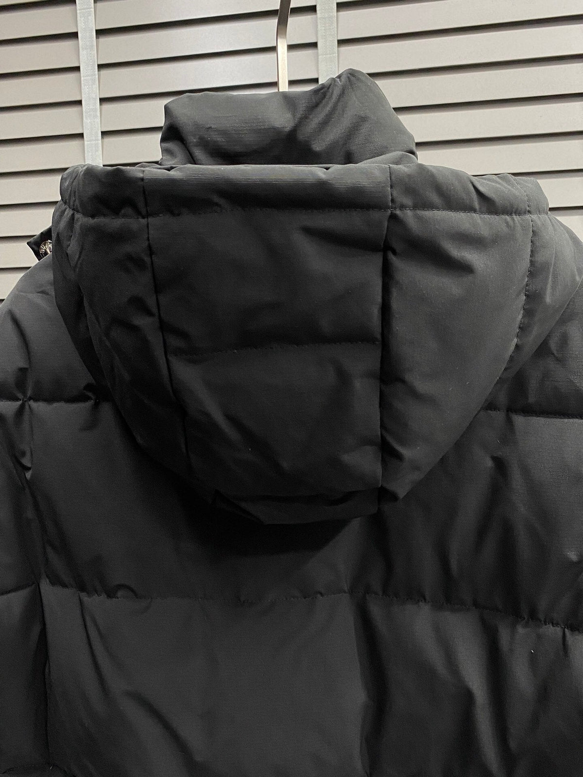 Chaqueta acolchada con capucha de plumón