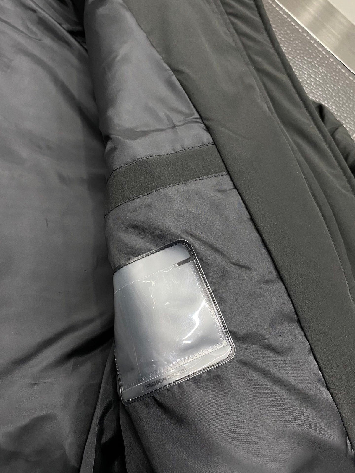 Chaqueta acolchada con capucha de plumón