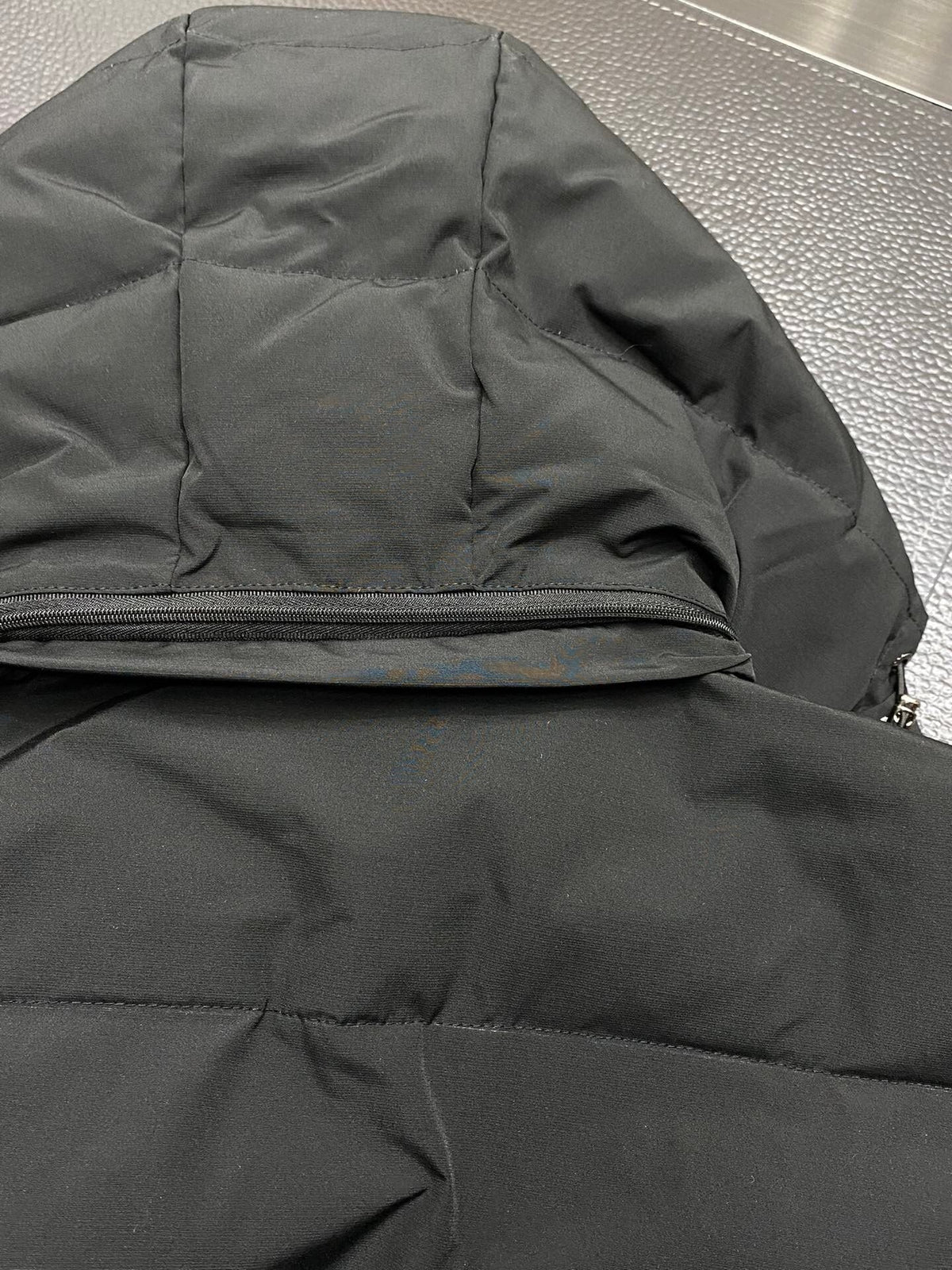 Chaqueta acolchada con capucha de plumón