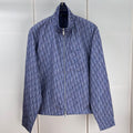 Chaqueta de cuello alto con cremallera y estampado oblicuo