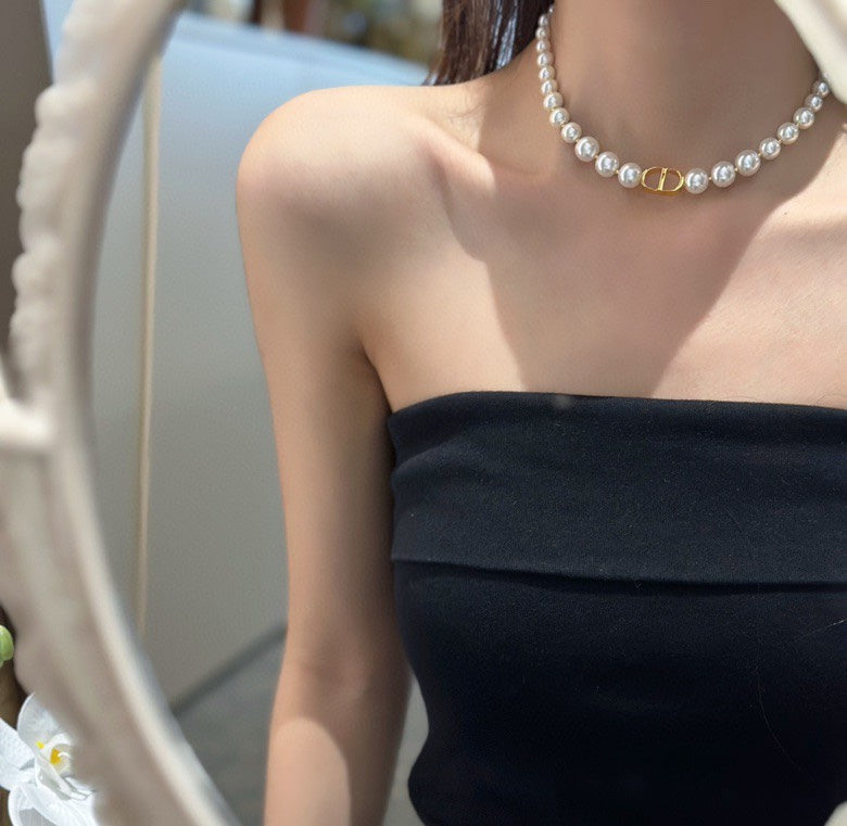 Collar de perlas CD