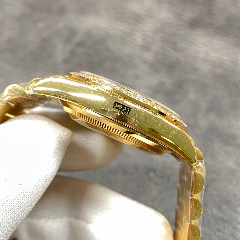 Reloj automático de 36 mm con esfera verde y dorada