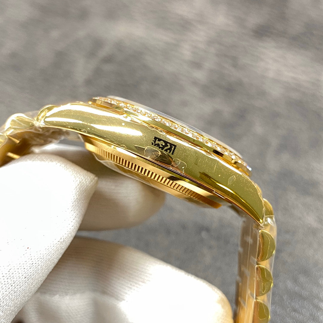 Reloj automático de 36 mm con esfera verde y dorada