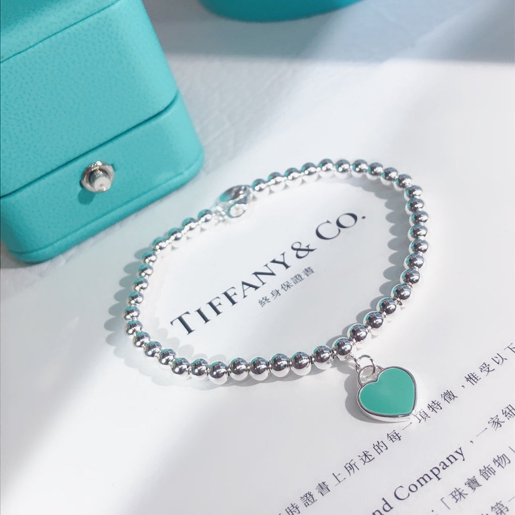 Pulsera de esmalte de doble corazón