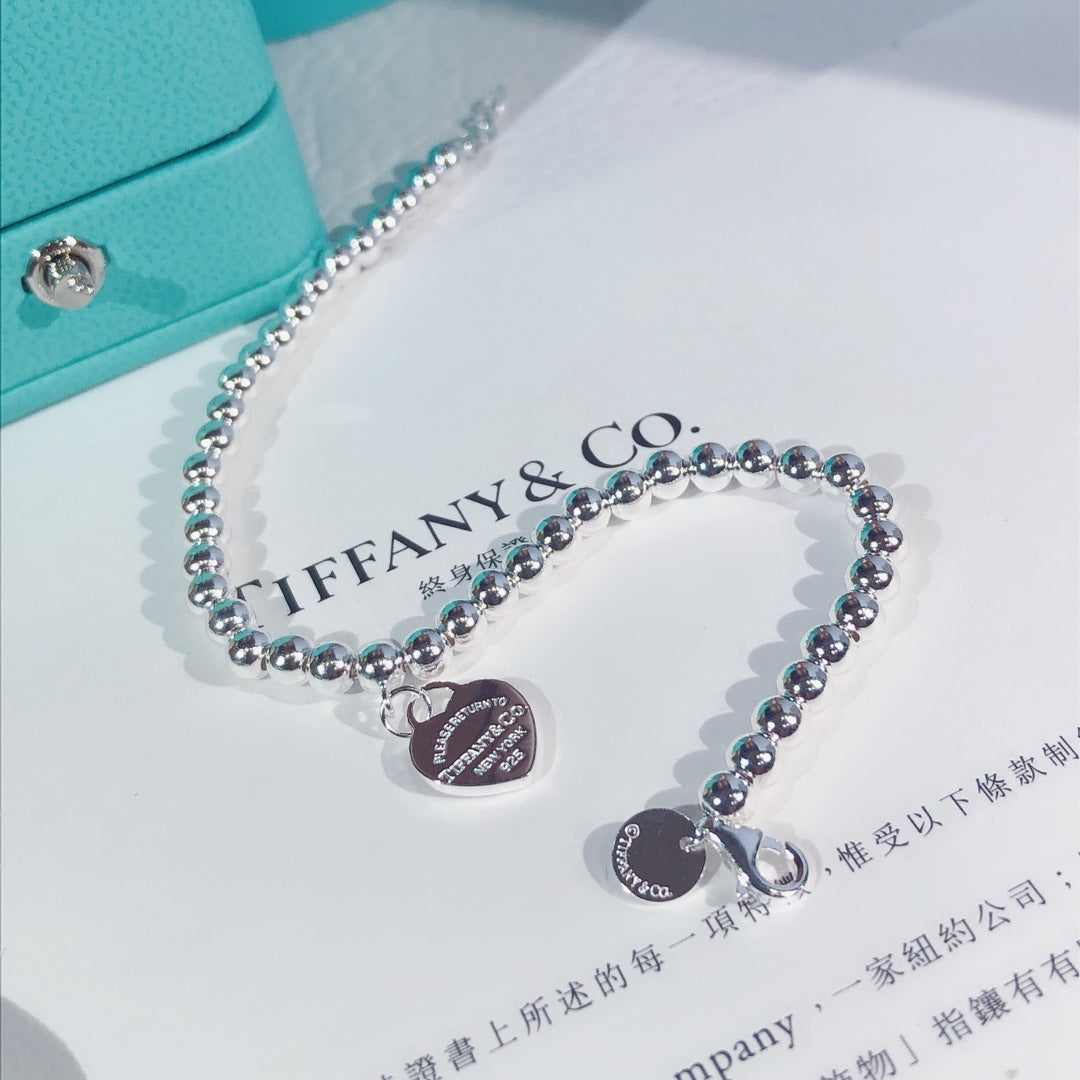 Pulsera de esmalte de doble corazón
