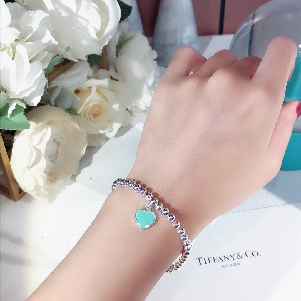 Pulsera de esmalte de doble corazón