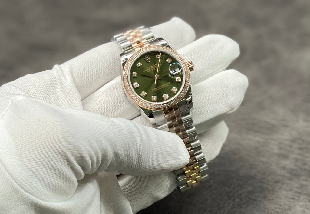Reloj de pulsera de 31 mm con esfera de nácar dorado