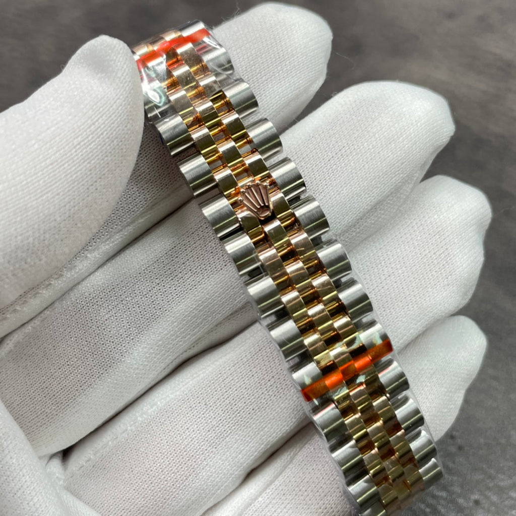 Reloj de pulsera de 31 mm con esfera de nácar dorado