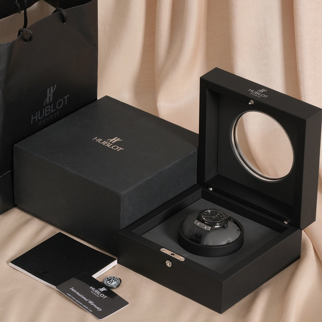 Reloj de 42 mm con esfera de carbono negro y bisel de acero