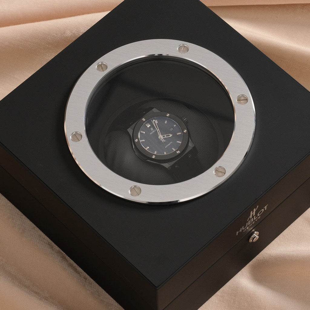 Reloj de 42 mm con esfera de carbono negro y bisel de acero
