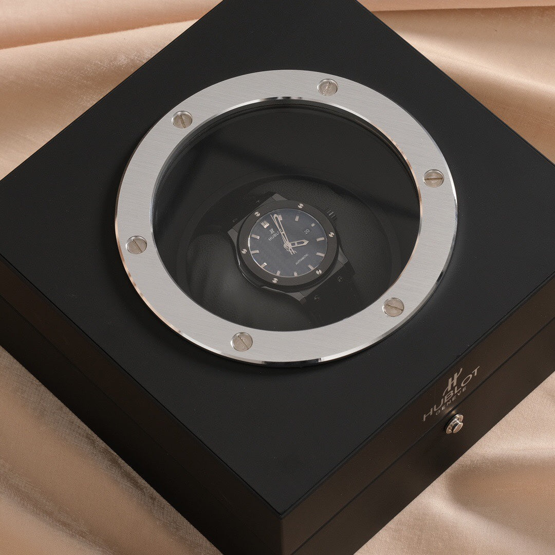 Reloj de 42 mm con esfera de carbono negro y bisel de acero
