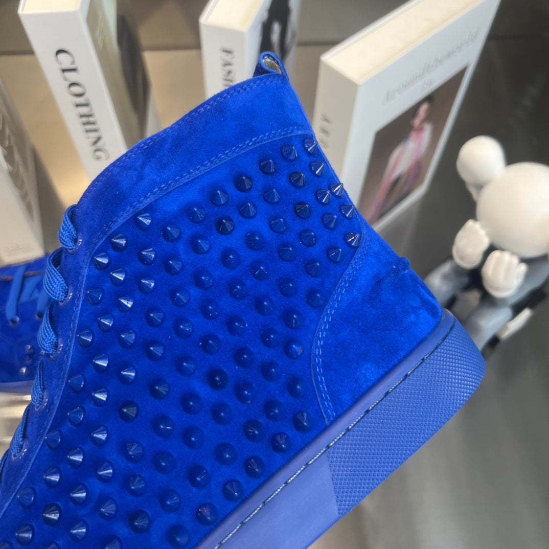 Zapatillas deportivas de lujo azules de caña alta con tachuelas