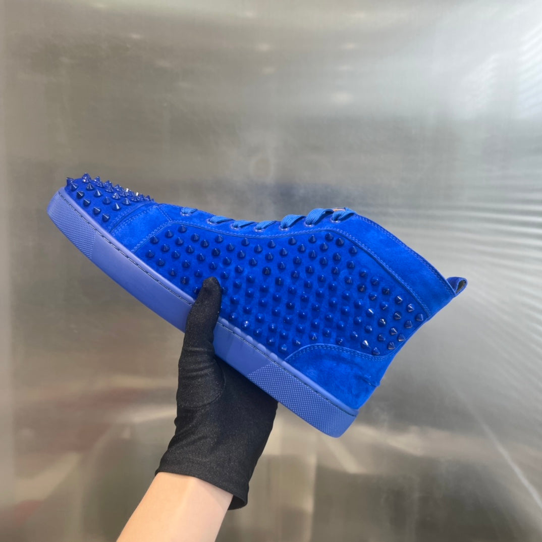 Zapatillas deportivas de lujo azules de caña alta con tachuelas