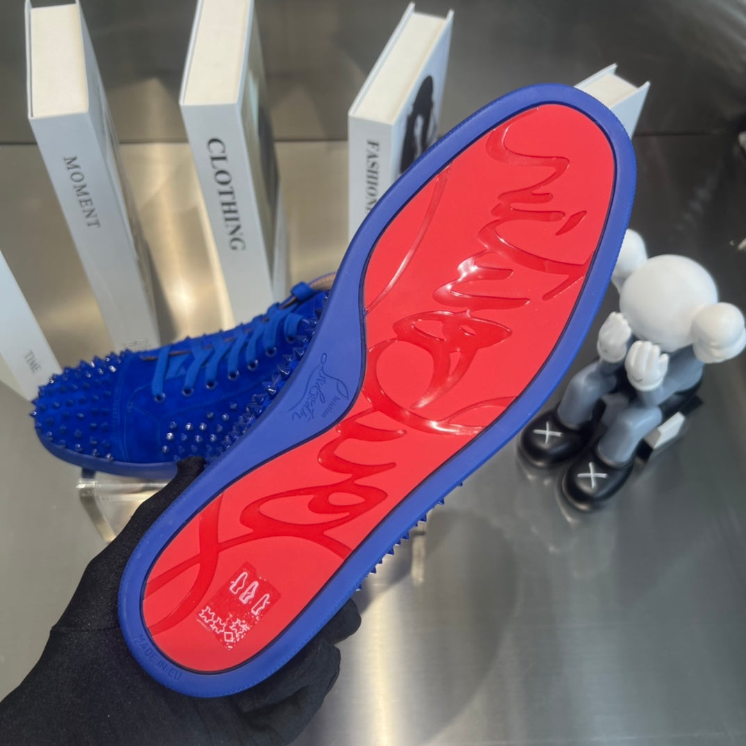 Zapatillas deportivas de lujo azules de caña alta con tachuelas