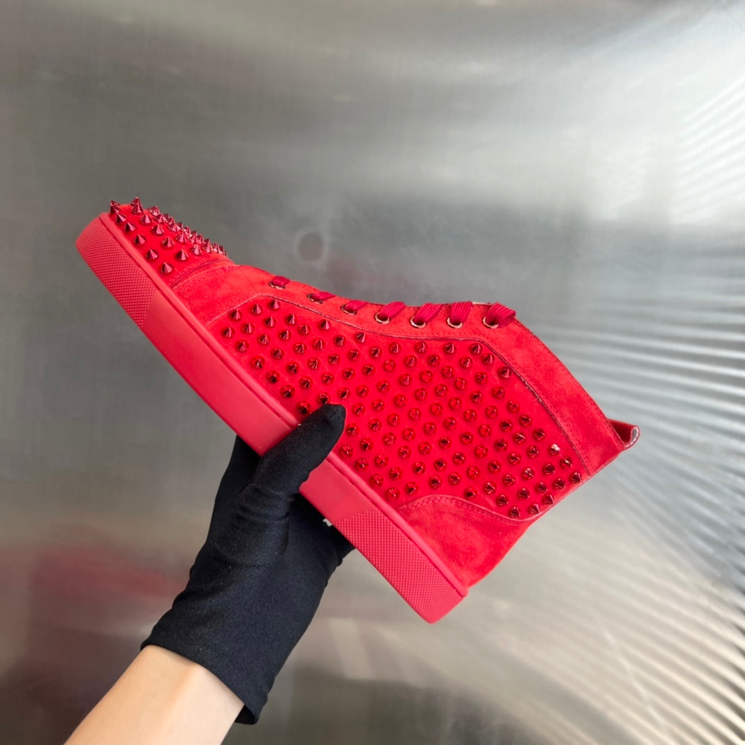 Zapatillas deportivas de lujo rojas con tachuelas de caña alta