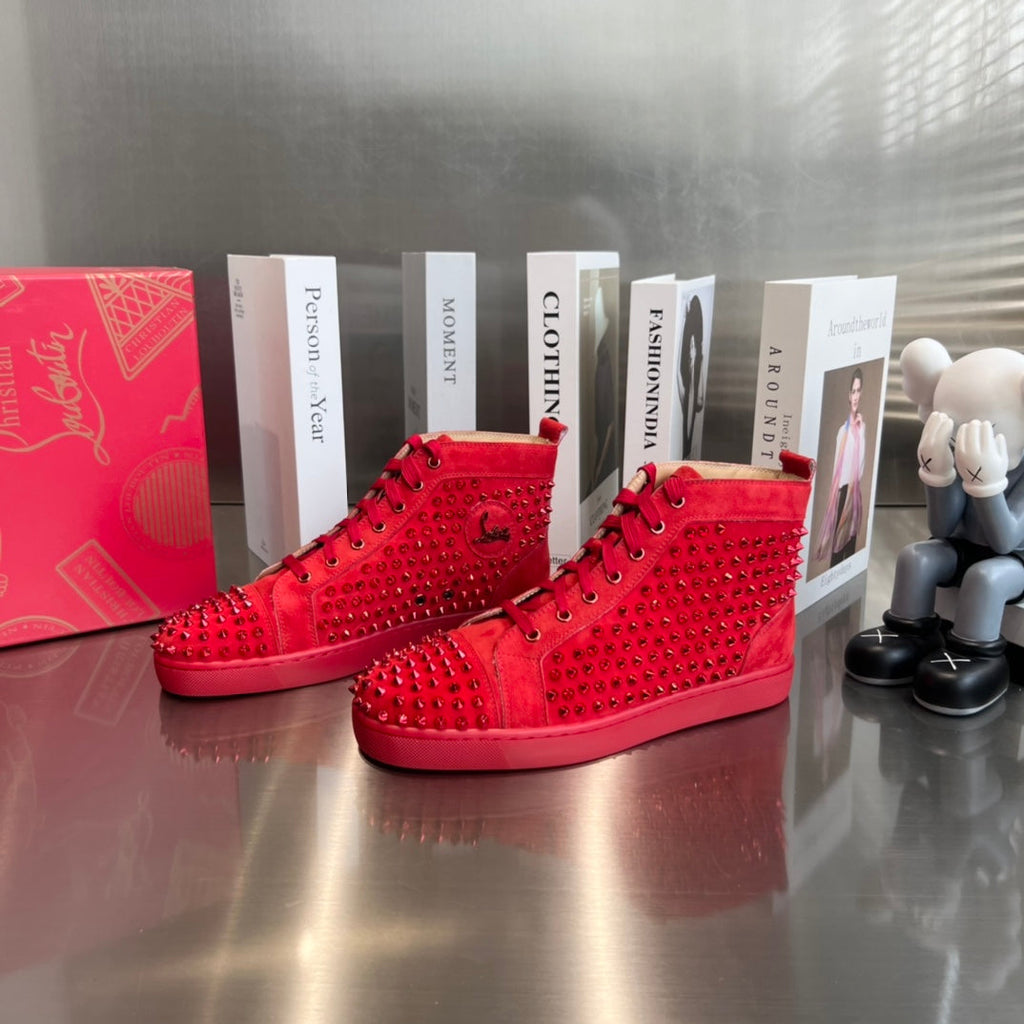 Zapatillas deportivas de lujo rojas con tachuelas de caña alta