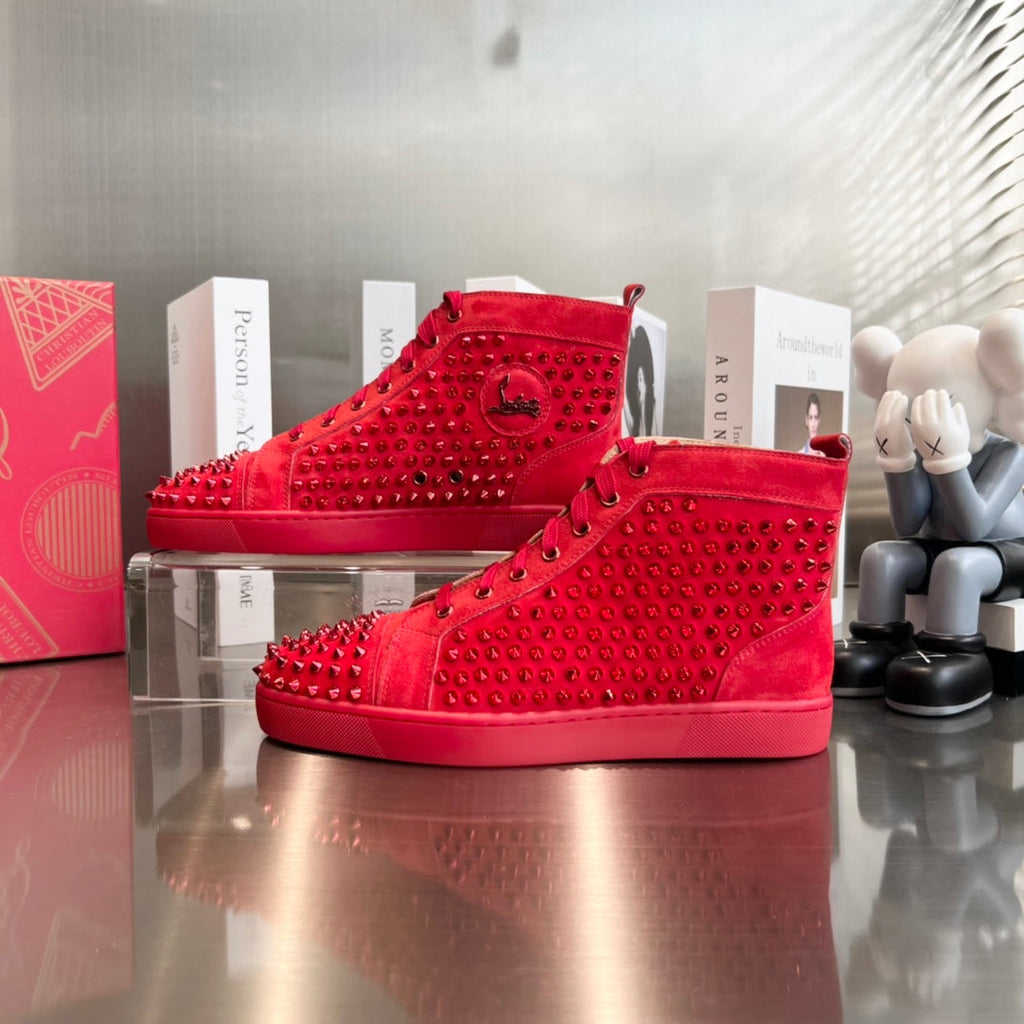 Zapatillas deportivas de lujo rojas con tachuelas de caña alta