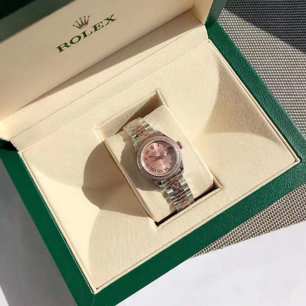 Reloj con esfera bicolor rosa