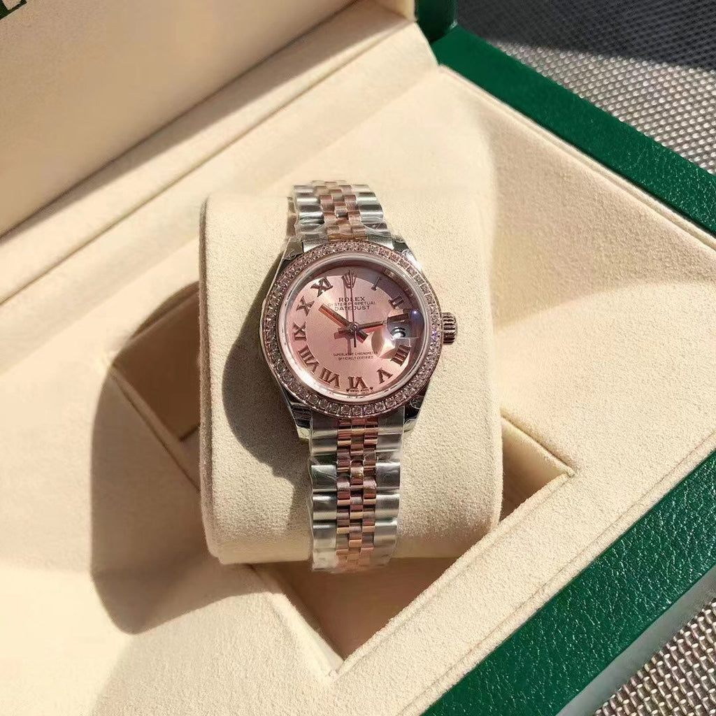 Reloj con esfera bicolor rosa