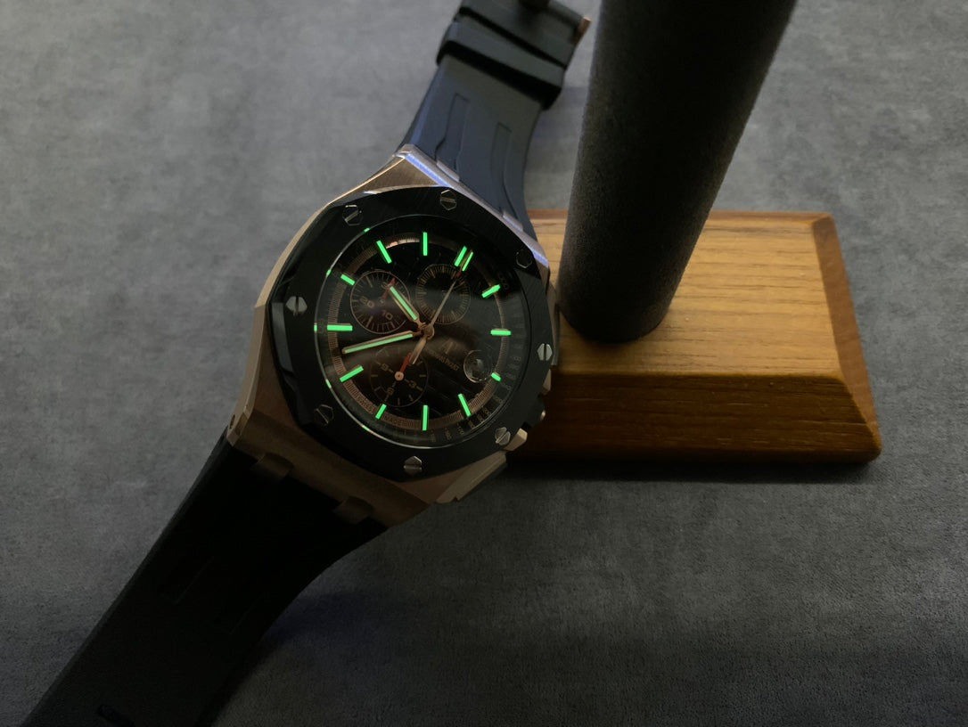 Cronógrafo de 44 mm con esfera negra y oro rosa