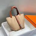 Bolsa tipo cubo de gabardina encerada