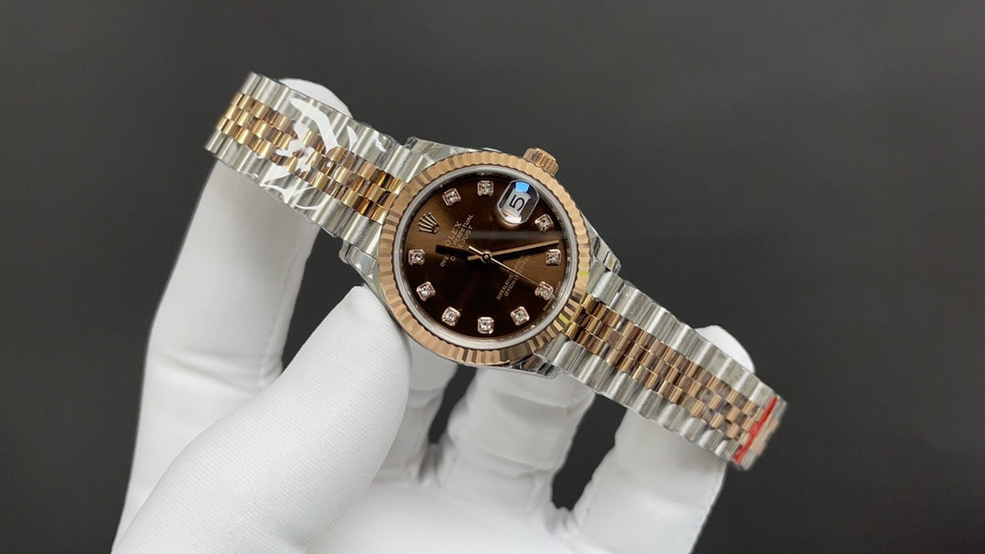 Reloj con esfera bicolor chocolate