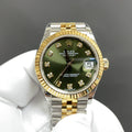 Reloj automático dorado y verde de 31 mm