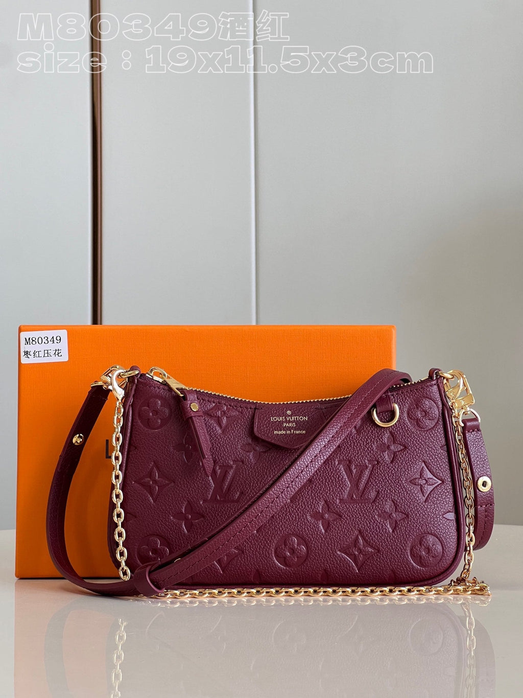 Bolso de hombro de piel repujada