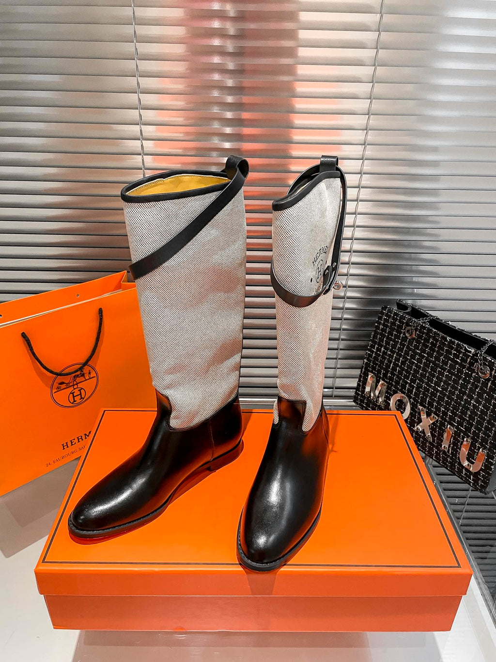 Botas largas con cinturón para mujer