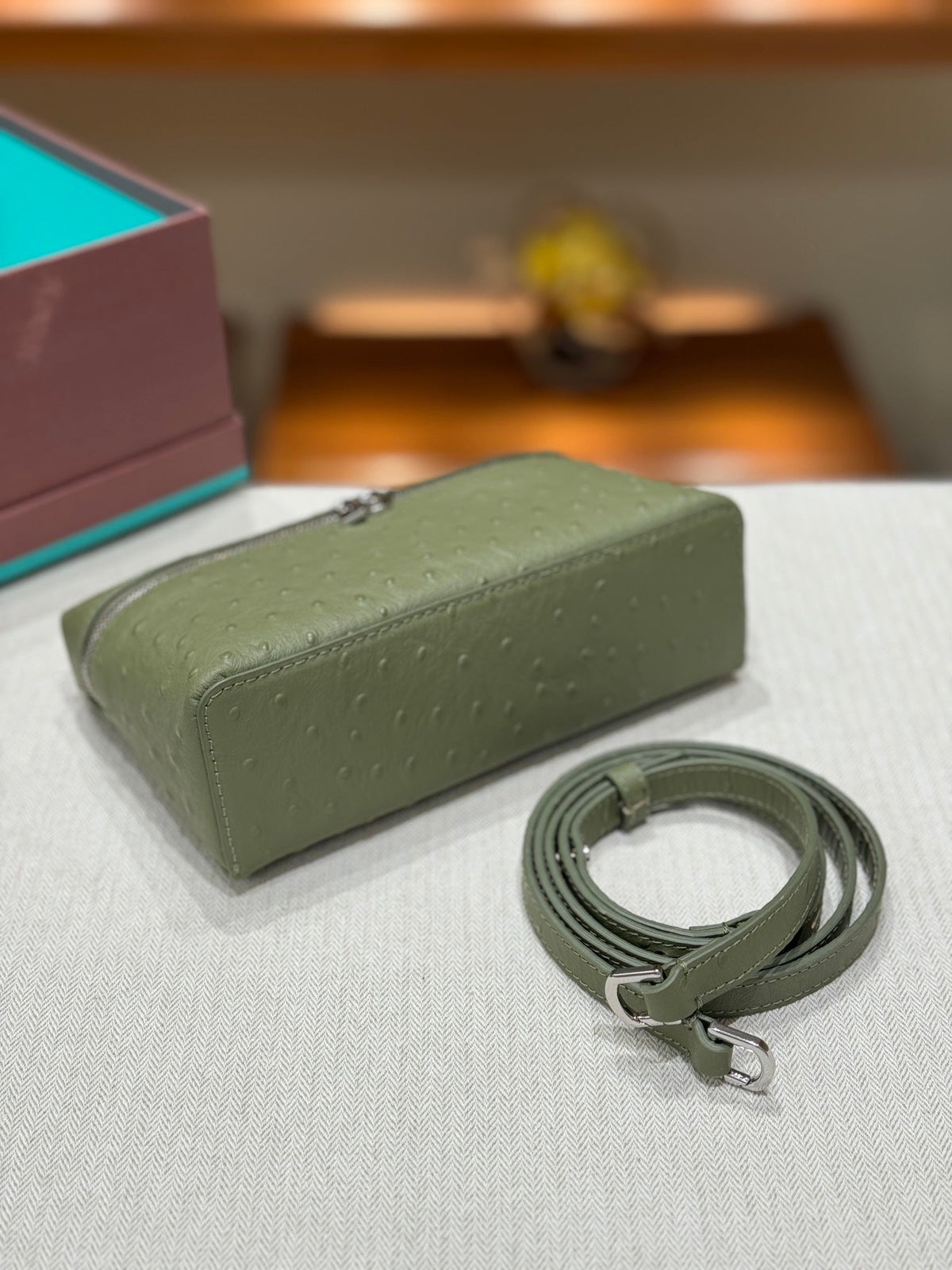 Bolso de mano Loro de piel de avestruz 19