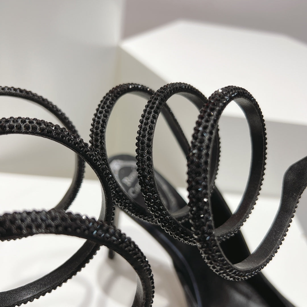 Zapatos de tacón con tira trasera y diseño de serpiente Cleo