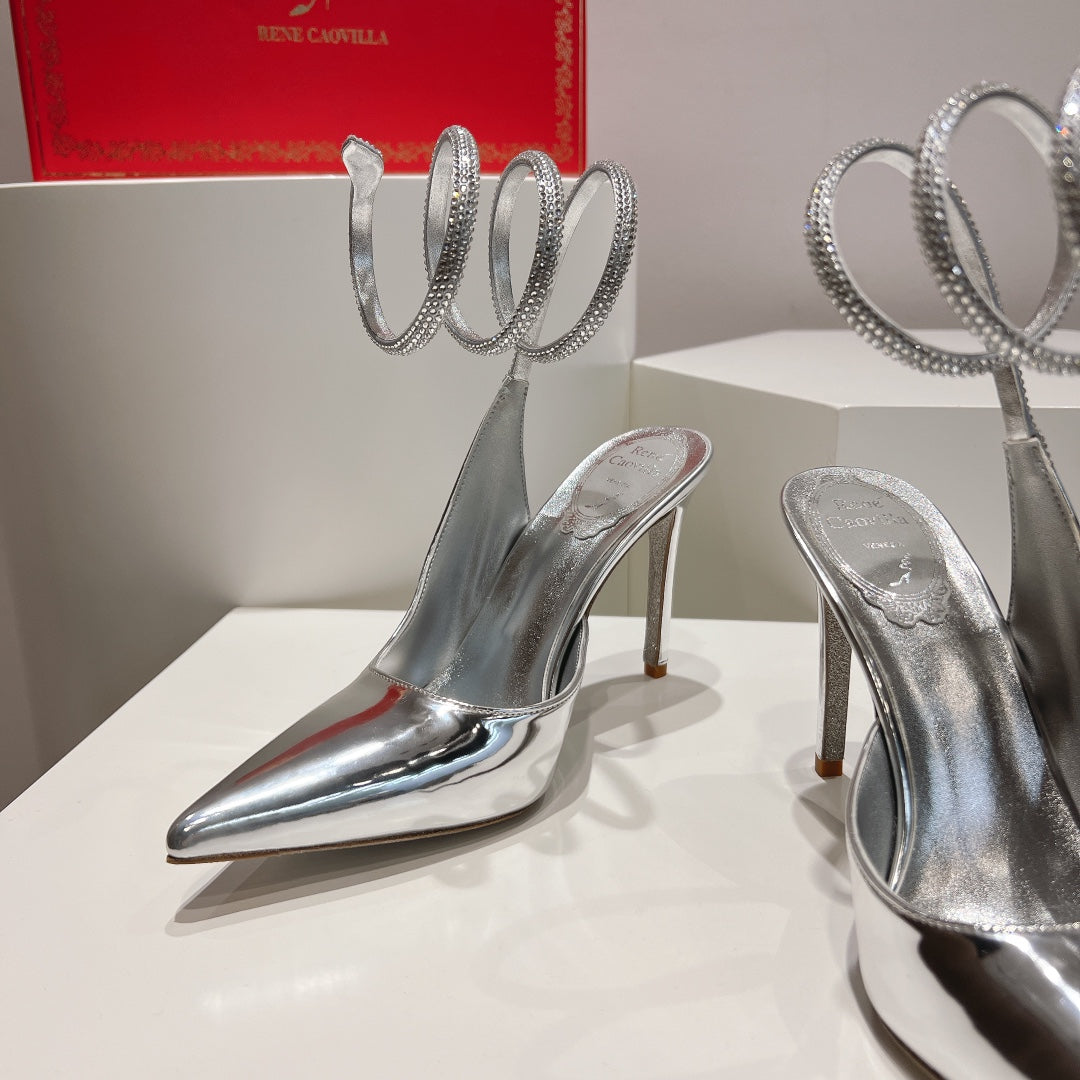 Zapatos de tacón con tira trasera y diseño de serpiente Cleo