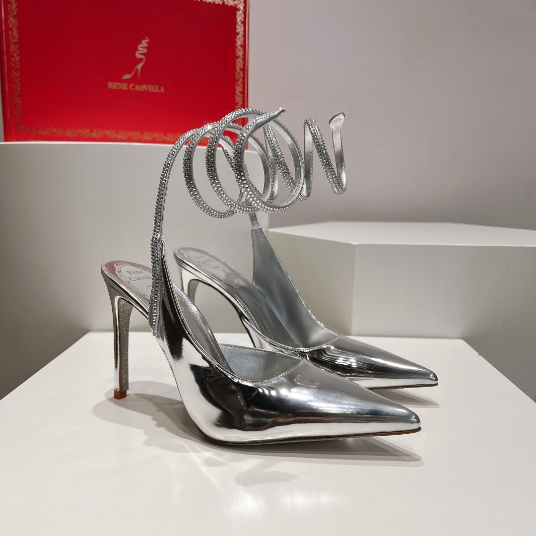 Zapatos de tacón con tira trasera y diseño de serpiente Cleo