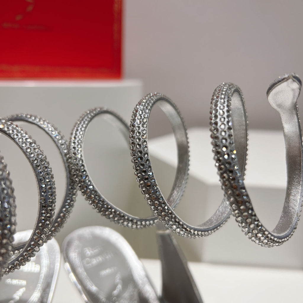 Zapatos de tacón con tira trasera y diseño de serpiente Cleo