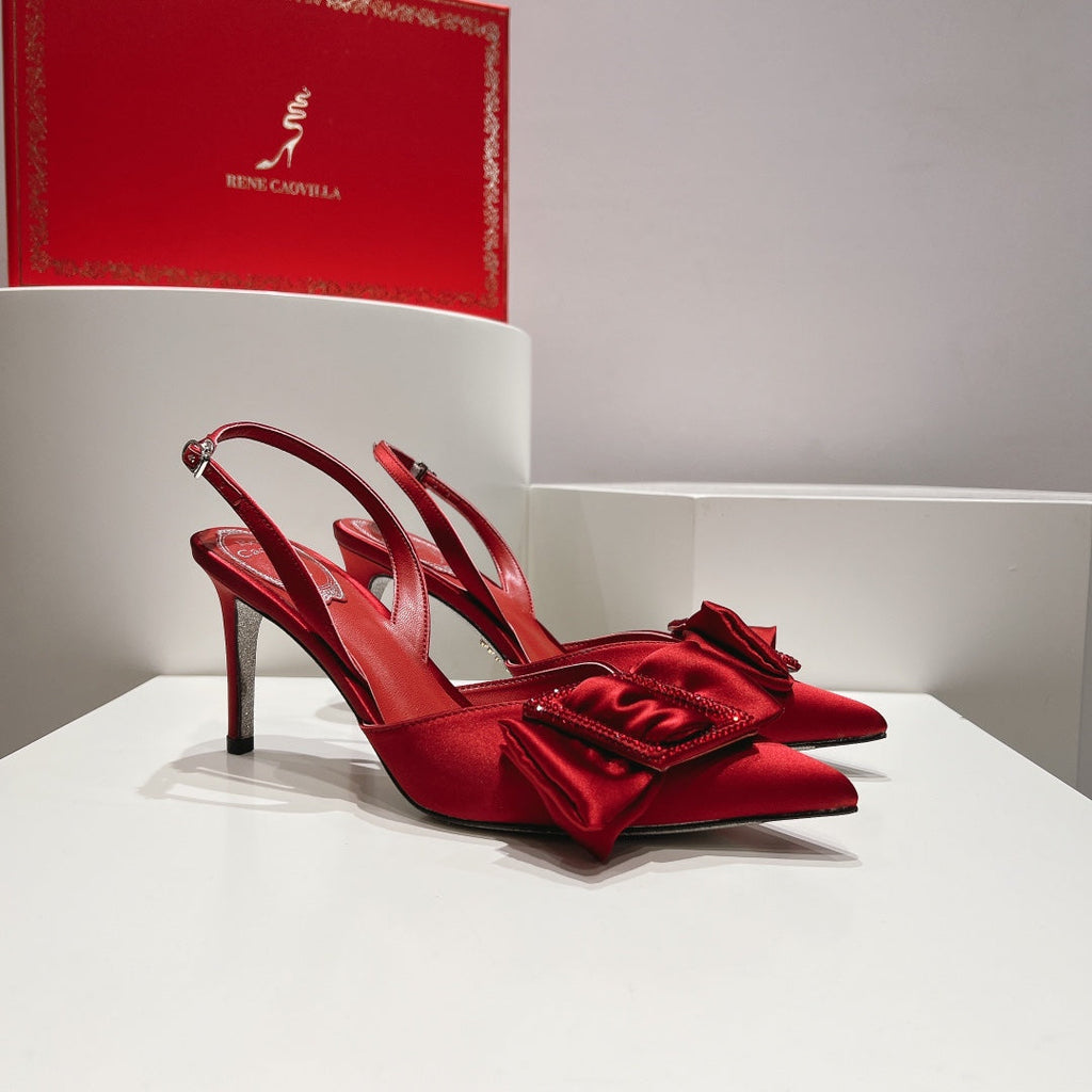 Tacones de cristal con lazo de seda