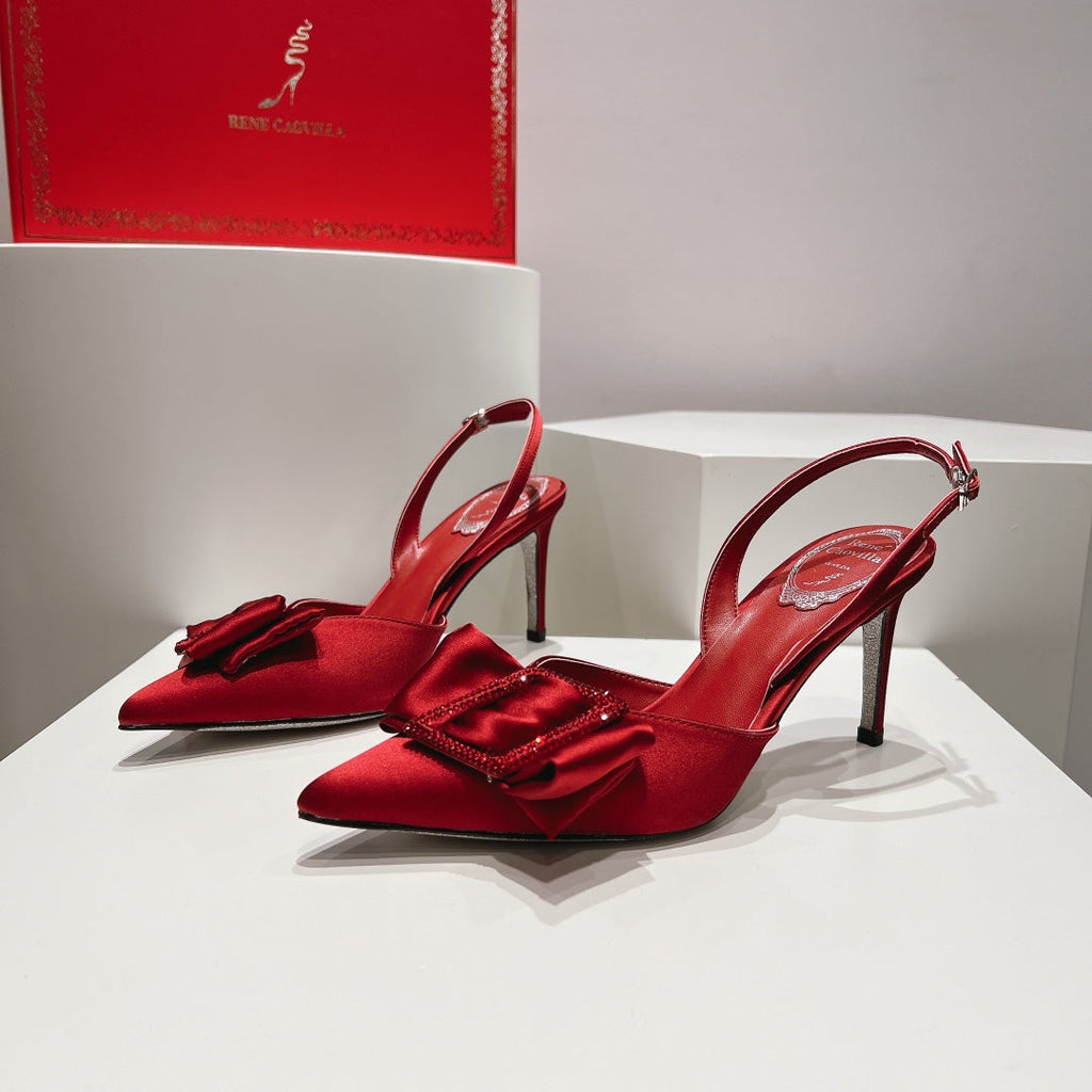 Tacones de cristal con lazo de seda