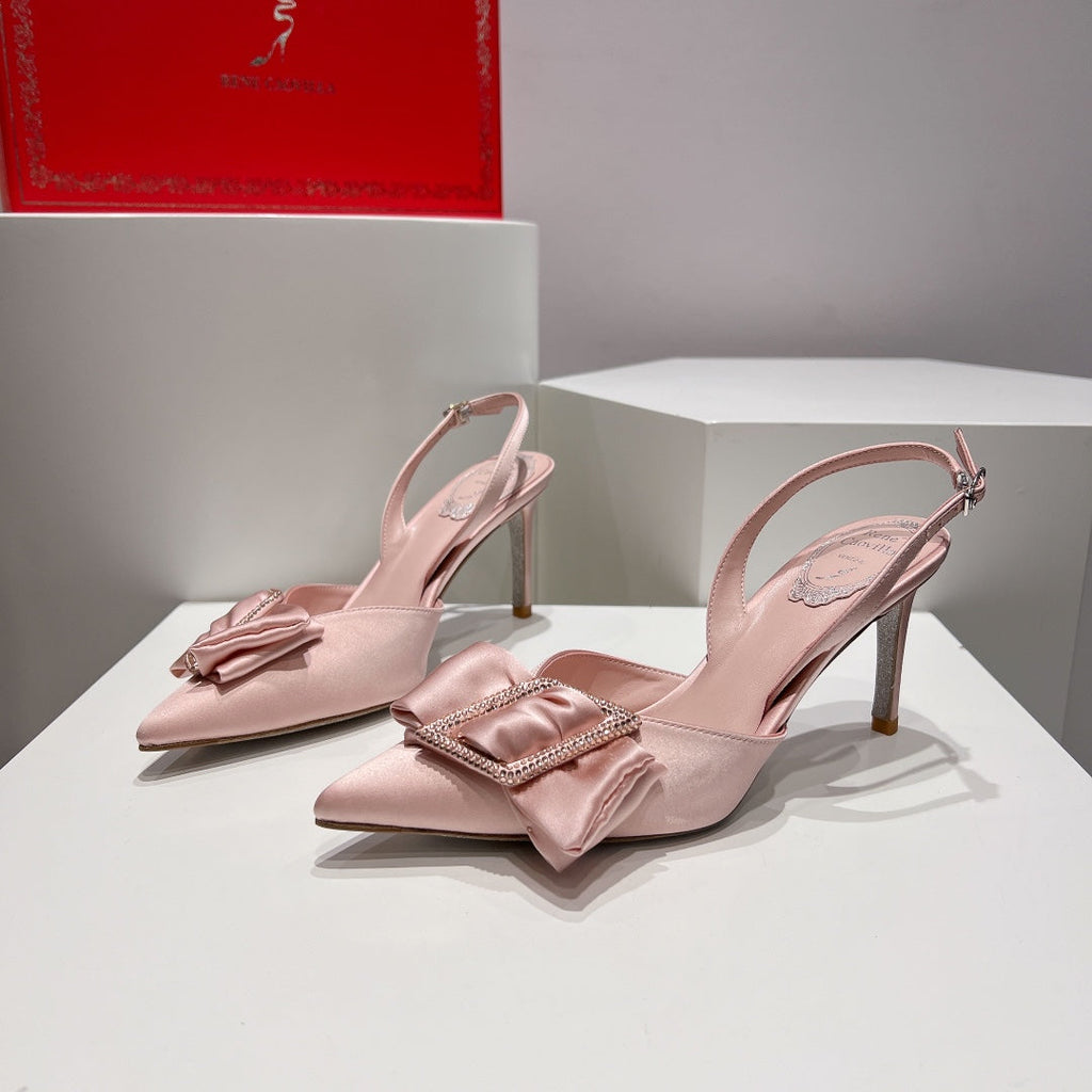 Tacones de cristal con lazo de seda