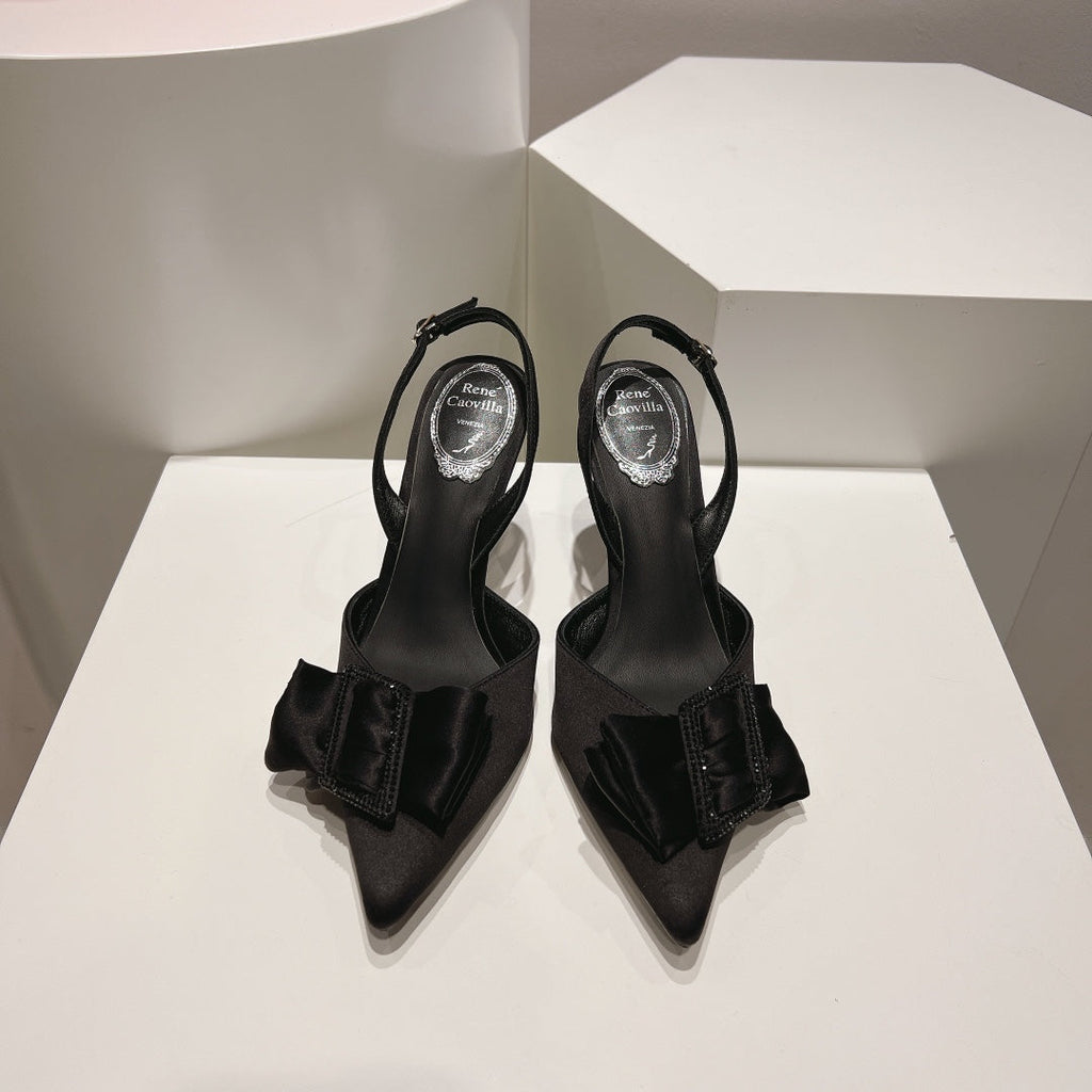 Tacones de cristal con lazo de seda